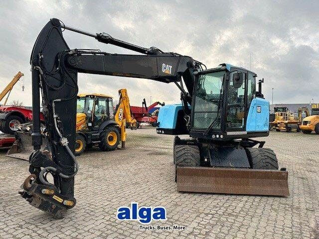 Caterpillar M315F, OilQuick, Hammer- u- Greifersteuerung - Gumikerekes kotró: 1 kép. Caterpillar M315F, OilQuick, Hammer- u- Greifersteuerung - Gumikerekes kotró: 1 kép.