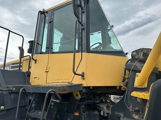 Komatsu WA 470-6, Schaufel mit Zähne 4,3m³ - Gumikerekes homlokrakodó: 4 kép. Komatsu WA 470-6, Schaufel mit Zähne 4,3m³ - Gumikerekes homlokrakodó: 4 kép.