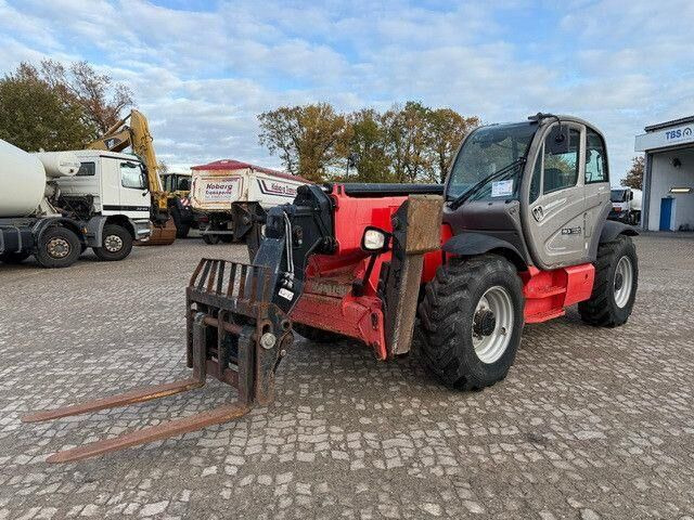 Manitou MT 1440, Teleskoplader, 13,5m.,4.0.to. Tragkraft - Teleszkópos rakodó: 3 kép. Manitou MT 1440, Teleskoplader, 13,5m.,4.0.to. Tragkraft - Teleszkópos rakodó: 3 kép.