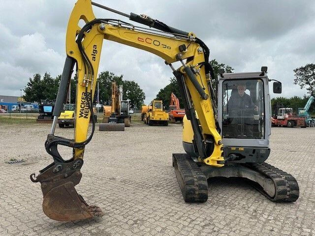 WACKER NEUSON 6003, Hydr. S.W.S., Hydr. Grabenlöffel - Minikotró: 2 kép. WACKER NEUSON 6003, Hydr. S.W.S., Hydr. Grabenlöffel - Minikotró: 2 kép.