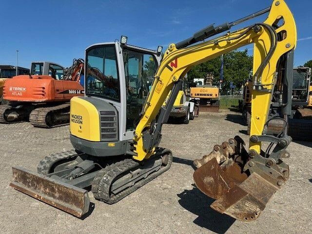 Wacker EZ 26, Hydr. S.W.S., 3x Löffel, Gummikette, TOP - Minikotró: 3 kép. Wacker EZ 26, Hydr. S.W.S., 3x Löffel, Gummikette, TOP - Minikotró: 3 kép.