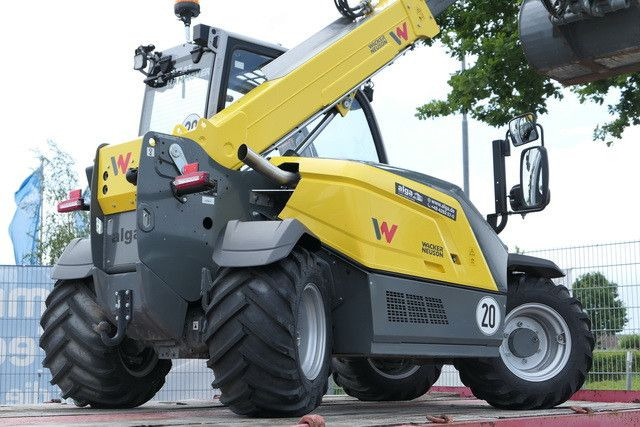 Wacker Neuson TH 412 4x4/nur 150 Std./wie NEU! - Gumikerekes homlokrakodó: 4 kép. Wacker Neuson TH 412 4x4/nur 150 Std./wie NEU! - Gumikerekes homlokrakodó: 4 kép.