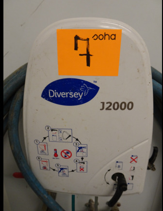 Dispositif de dosage Diversey - Élelmiszer-feldolgozó gép: 2 kép. Dispositif de dosage Diversey - Élelmiszer-feldolgozó gép: 2 kép.