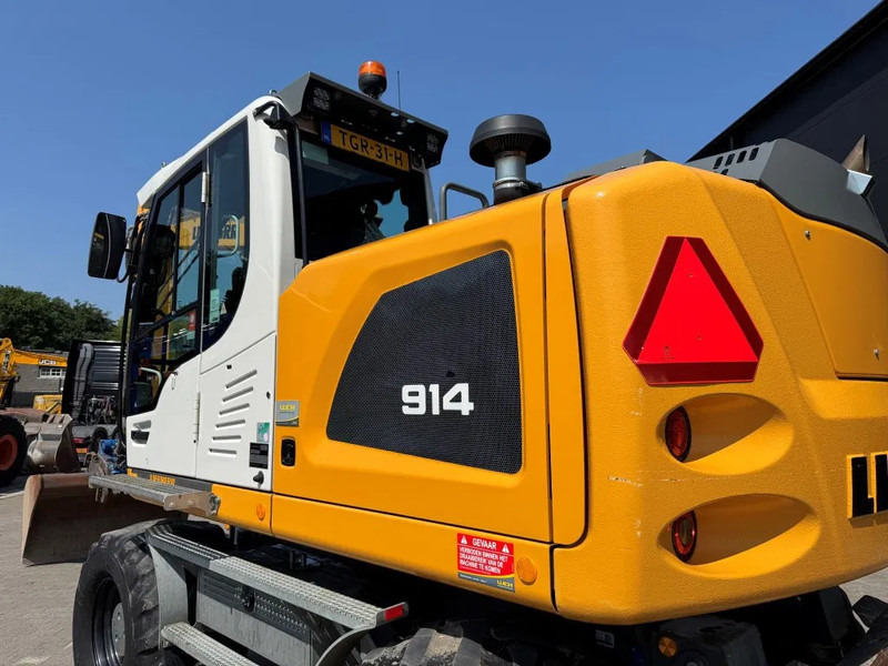 Liebherr A914 2019 7300 uur !! NL MACHINE !! - Gumikerekes kotró: 4 kép. Liebherr A914 2019 7300 uur !! NL MACHINE !! - Gumikerekes kotró: 4 kép.