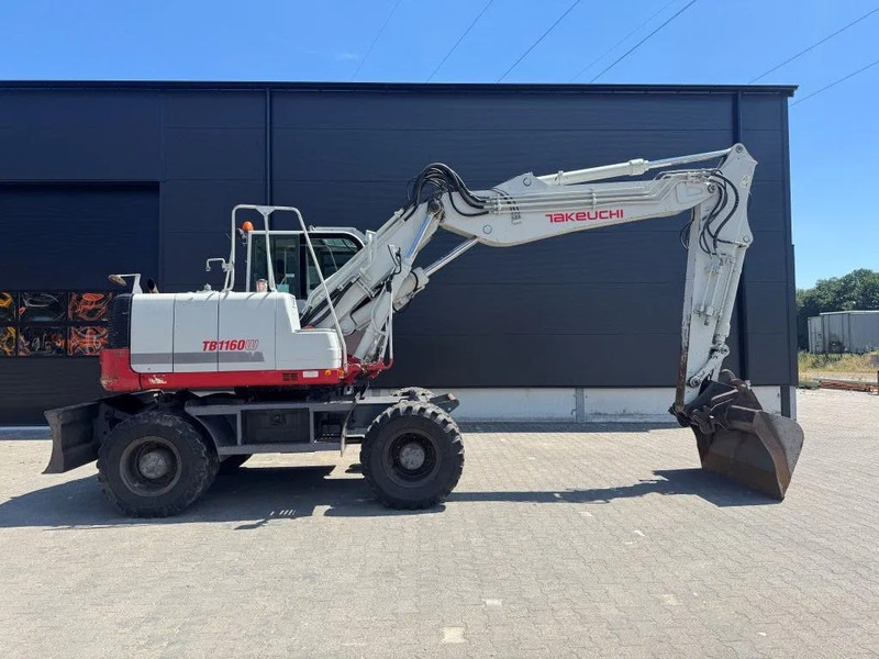 Takeuchi TB1160W - Gumikerekes kotró: 3 kép. Takeuchi TB1160W - Gumikerekes kotró: 3 kép.