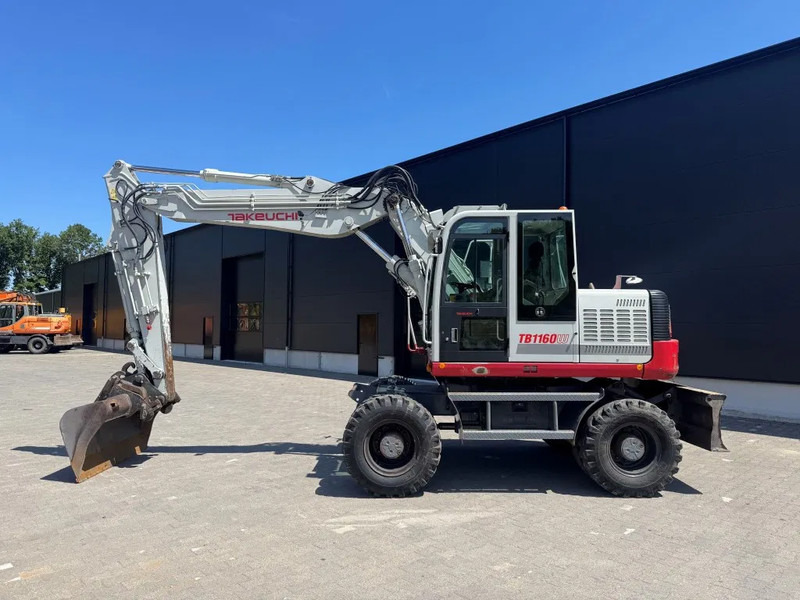 Takeuchi TB1160W - Gumikerekes kotró: 1 kép. Takeuchi TB1160W - Gumikerekes kotró: 1 kép.