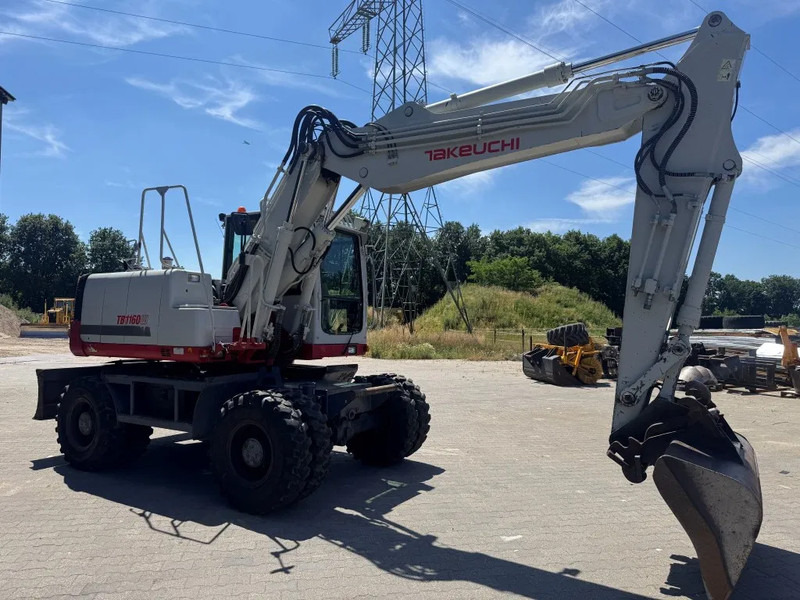 Takeuchi TB1160W - Gumikerekes kotró: 5 kép. Takeuchi TB1160W - Gumikerekes kotró: 5 kép.