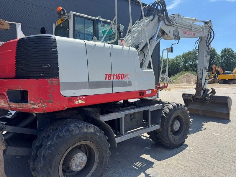 Takeuchi TB1160W - Gumikerekes kotró: 4 kép. Takeuchi TB1160W - Gumikerekes kotró: 4 kép.