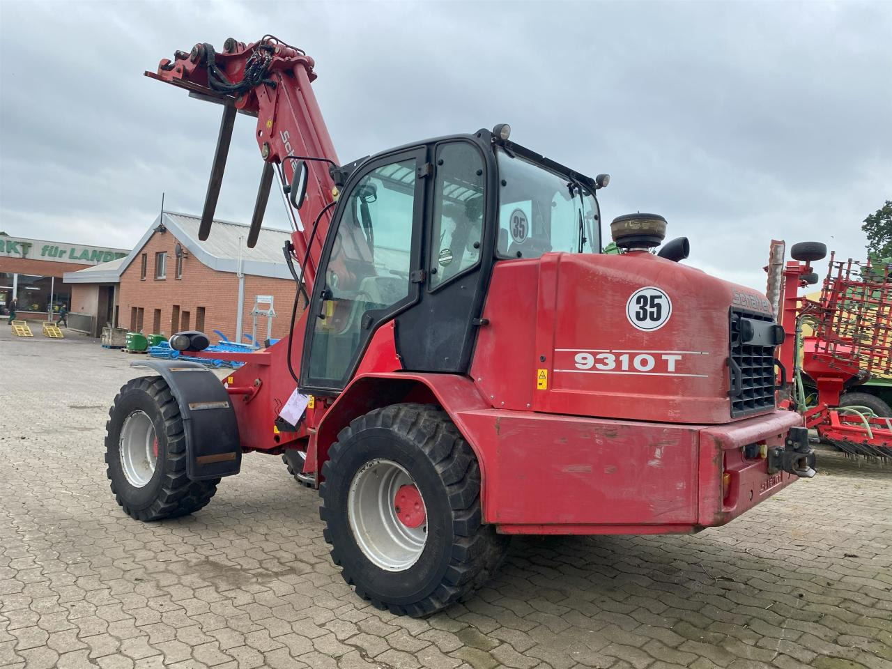 Schäffer 9310T - Teleszkópos rakodó: 2 kép. Schäffer 9310T - Teleszkópos rakodó: 2 kép.