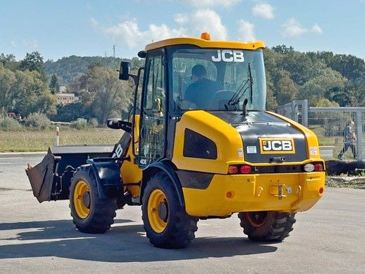 Gumikerekes homlokrakodó JCB 406 t4 * RADLADER * 4x4 * TOPZUSTAND: 7 kép.