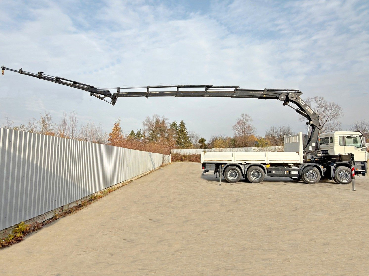 MAN TGA 35.430 * HIAB 422 E - 5 HIPRO + JIB 100X - Darus autó: 5 kép. MAN TGA 35.430 * HIAB 422 E - 5 HIPRO + JIB 100X - Darus autó: 5 kép.