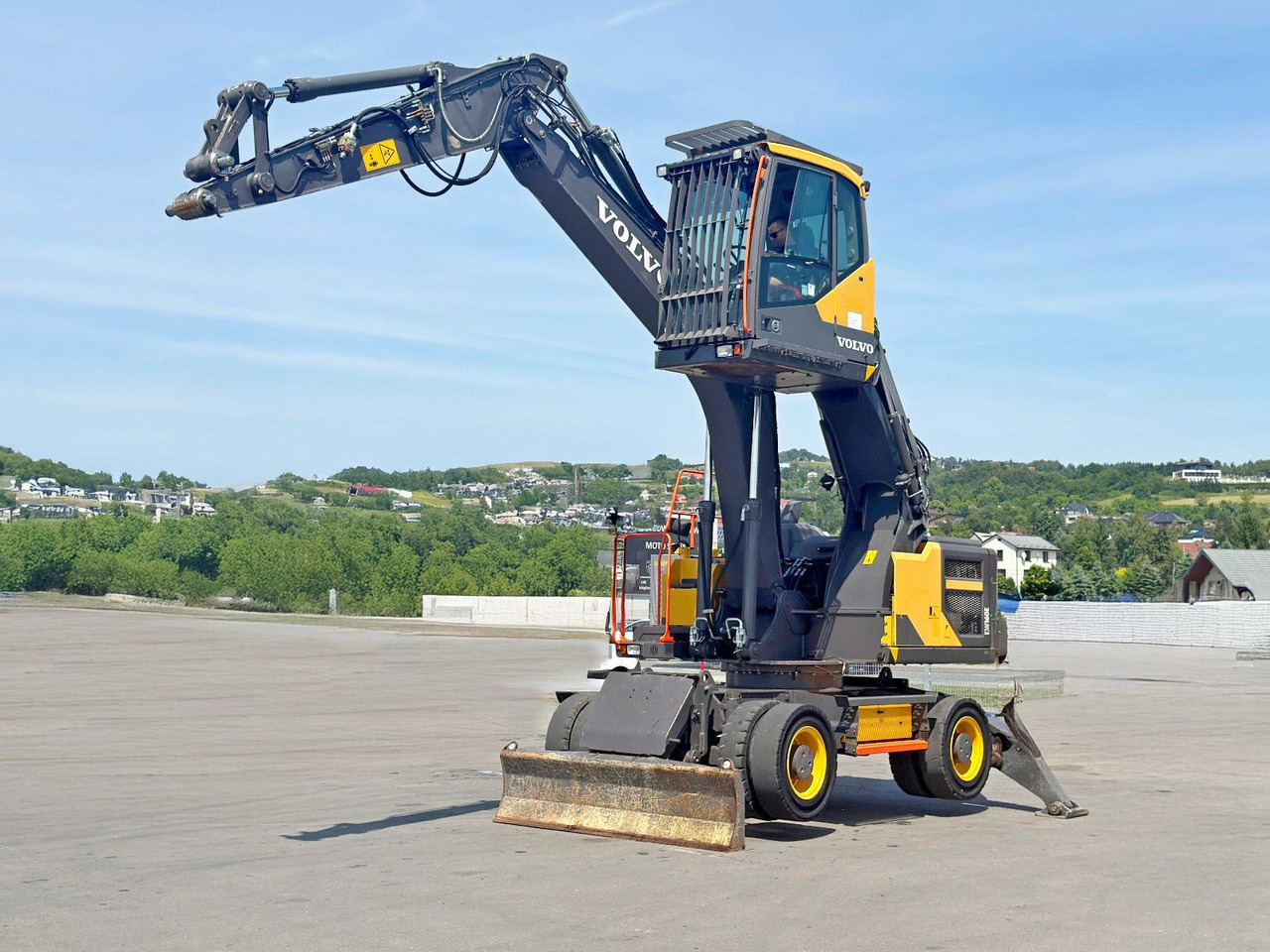 Volvo EW 160 E* Umschlagbagger * TOPZUSTAND - Gumikerekes kotró: 1 kép. Volvo EW 160 E* Umschlagbagger * TOPZUSTAND - Gumikerekes kotró: 1 kép.
