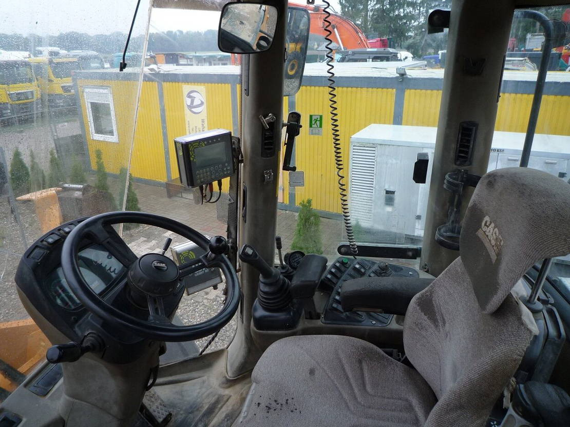 Gumikerekes homlokrakodó Case 921E: 14 kép. Gumikerekes homlokrakodó Case 921E: 14 kép.