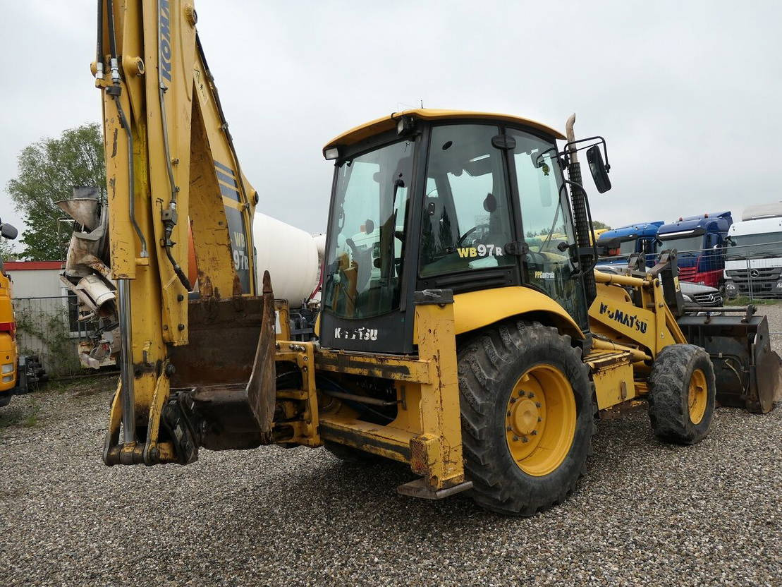 Komatsu WB 97-5 - Kotrórakodó: 5 kép. Komatsu WB 97-5 - Kotrórakodó: 5 kép.