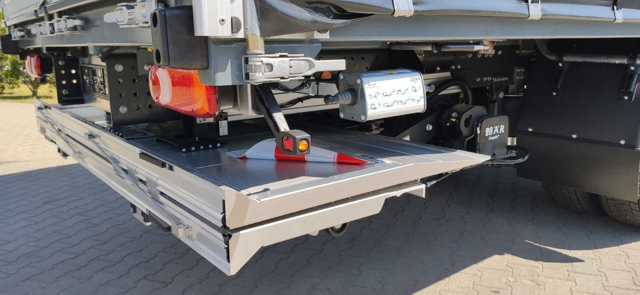 Iveco EUROCARGO ML180E32/P 20PAL DHOLLANDIA - Ponyvás teherautó: 5 kép. Iveco EUROCARGO ML180E32/P 20PAL DHOLLANDIA - Ponyvás teherautó: 5 kép.