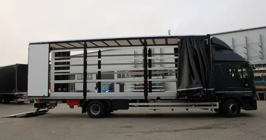 Iveco EUROCARGO ML180E32/P 20PAL DHOLLANDIA - Ponyvás teherautó: 3 kép. Iveco EUROCARGO ML180E32/P 20PAL DHOLLANDIA - Ponyvás teherautó: 3 kép.