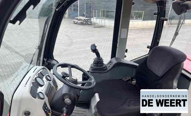 Schäffer 9300 Z - Gumikerekes homlokrakodó: 5 kép. Schäffer 9300 Z - Gumikerekes homlokrakodó: 5 kép.