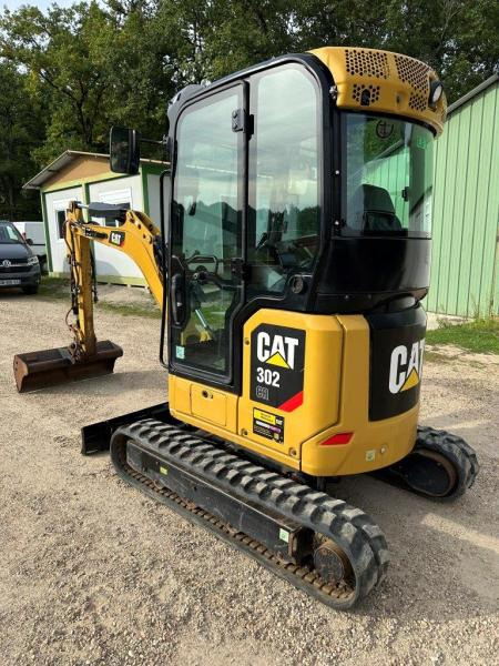 Caterpillar 302 CR - Minikotró: 2 kép. Caterpillar 302 CR - Minikotró: 2 kép.