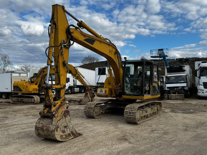 Caterpillar 312 C Mit Zwei Löffeln - Lánctalpas kotró: 3 kép. Caterpillar 312 C Mit Zwei Löffeln - Lánctalpas kotró: 3 kép.