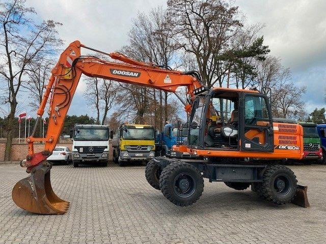 Doosan DX 160 W-3 - Gumikerekes kotró: 5 kép. Doosan DX 160 W-3 - Gumikerekes kotró: 5 kép.