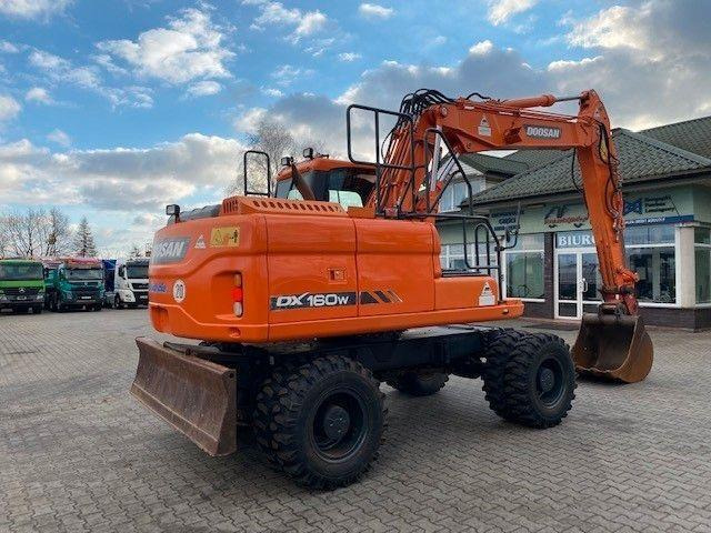 Doosan DX 160 W-3 - Gumikerekes kotró: 3 kép. Doosan DX 160 W-3 - Gumikerekes kotró: 3 kép.