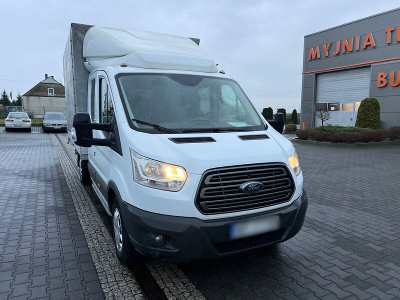 Ford Transit Doka Brygadówka 7-miejsc Plandeka - Ponyvás kisteherautó: 5 kép. Ford Transit Doka Brygadówka 7-miejsc Plandeka - Ponyvás kisteherautó: 5 kép.