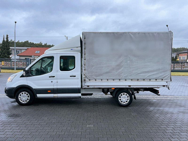 Ford Transit Doka Brygadówka 7-miejsc Plandeka - Ponyvás kisteherautó: 2 kép. Ford Transit Doka Brygadówka 7-miejsc Plandeka - Ponyvás kisteherautó: 2 kép.