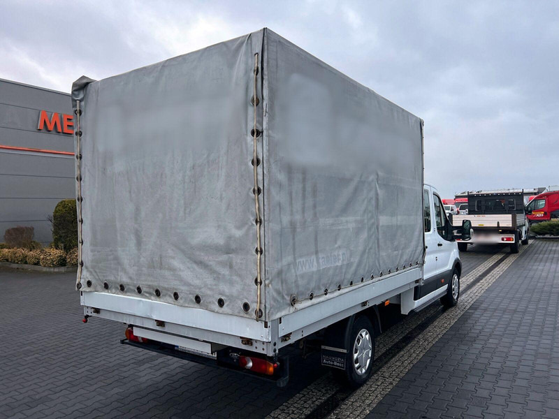 Ford Transit Doka Brygadówka 7-miejsc Plandeka - Ponyvás kisteherautó: 4 kép. Ford Transit Doka Brygadówka 7-miejsc Plandeka - Ponyvás kisteherautó: 4 kép.