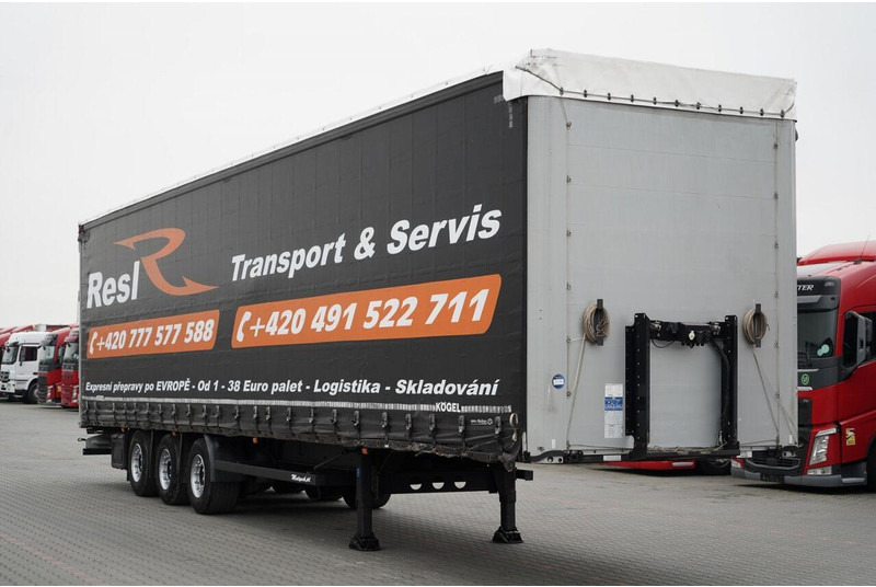 Kögel FIRANKA / MEGA / OŚ PODNOSZONA / OSIE SAF / DACH PODNOSZONY / LO - Ponyvás félpótkocsi: 1 kép. Kögel FIRANKA / MEGA / OŚ PODNOSZONA / OSIE SAF / DACH PODNOSZONY / LO - Ponyvás félpótkocsi: 1 kép.