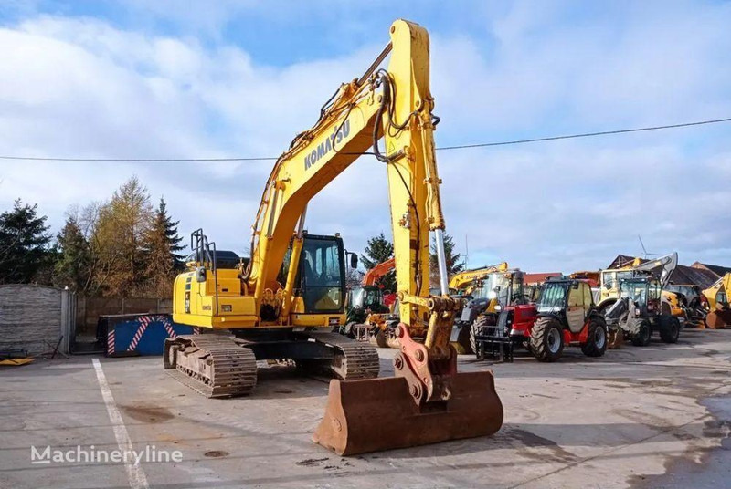 Komatsu PC 210LC-11 Crawler excavator - Lánctalpas kotró: 4 kép. Komatsu PC 210LC-11 Crawler excavator - Lánctalpas kotró: 4 kép.