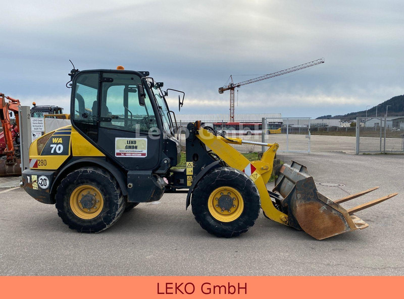 Komatsu WA70-6 Schnellwechsler - Gumikerekes homlokrakodó: 4 kép. Komatsu WA70-6 Schnellwechsler - Gumikerekes homlokrakodó: 4 kép.