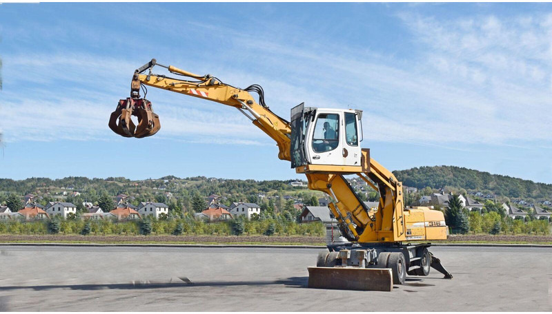 Liebherr PELLE A316 - Gumikerekes kotró: 1 kép. Liebherr PELLE A316 - Gumikerekes kotró: 1 kép.