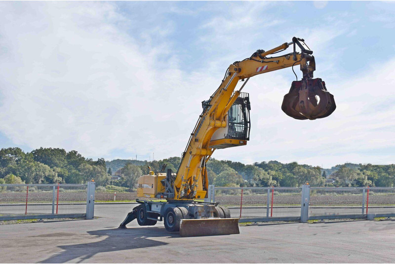 Liebherr PELLE A316 - Gumikerekes kotró: 5 kép. Liebherr PELLE A316 - Gumikerekes kotró: 5 kép.