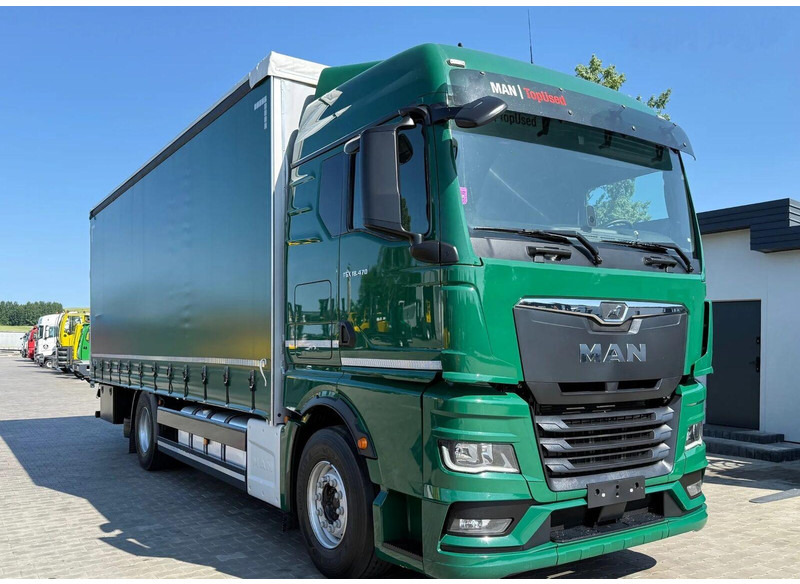 MAN TGX 18.470 - Curtain side - Ponyvás teherautó: 2 kép. MAN TGX 18.470 - Curtain side - Ponyvás teherautó: 2 kép.