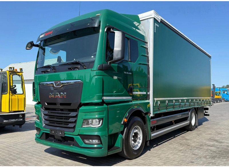 MAN TGX 18.470 - Curtain side - Ponyvás teherautó: 1 kép. MAN TGX 18.470 - Curtain side - Ponyvás teherautó: 1 kép.