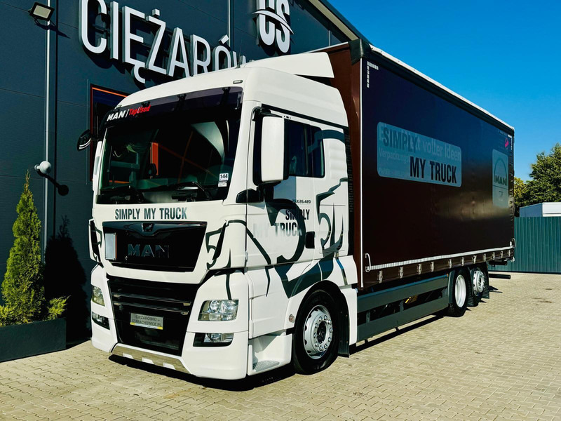 MAN TGX 26.420 - Ponyvás teherautó: 1 kép. MAN TGX 26.420 - Ponyvás teherautó: 1 kép.