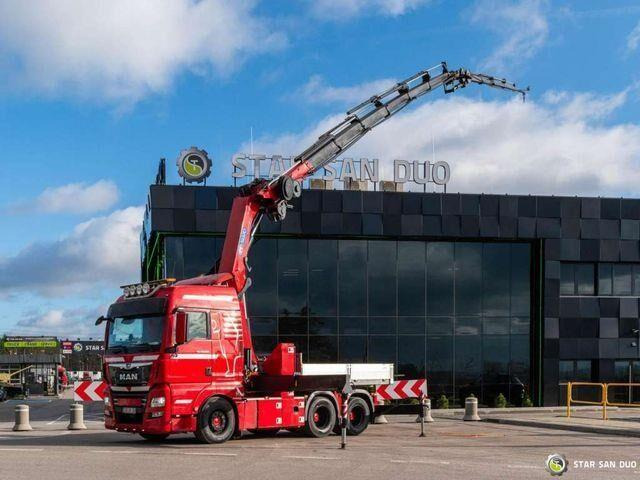 MAN TGX 28.500 6x2 HMF 5020K-RC Fly Jib Crane - Platós teherautó, Darus autó: 2 kép. MAN TGX 28.500 6x2 HMF 5020K-RC Fly Jib Crane - Platós teherautó, Darus autó: 2 kép.