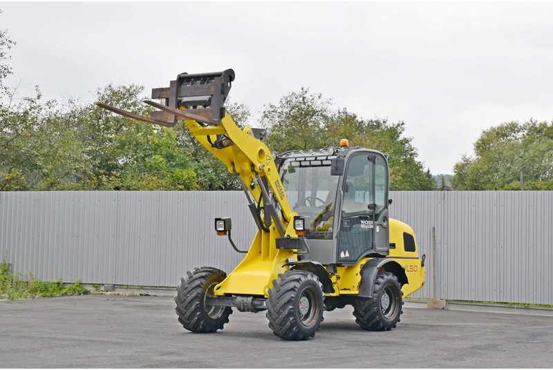 Neuson WACKER WL 50 - Gumikerekes homlokrakodó: 1 kép. Neuson WACKER WL 50 - Gumikerekes homlokrakodó: 1 kép.