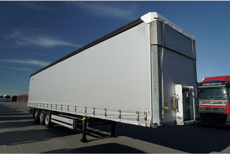 Schmitz Cargobull FIRANKA / STANDARD / MULDA DO STALI - 9 M / DACH PODNOSZONY / OŚ - Ponyvás félpótkocsi: 2 kép. Schmitz Cargobull FIRANKA / STANDARD / MULDA DO STALI - 9 M / DACH PODNOSZONY / OŚ - Ponyvás félpótkocsi: 2 kép.