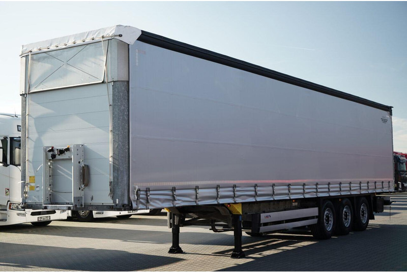 Schmitz Cargobull FIRANKA / STANDARD / MULDA DO STALI - 9 M / DACH PODNOSZONY / OŚ - Ponyvás félpótkocsi: 3 kép. Schmitz Cargobull FIRANKA / STANDARD / MULDA DO STALI - 9 M / DACH PODNOSZONY / OŚ - Ponyvás félpótkocsi: 3 kép.