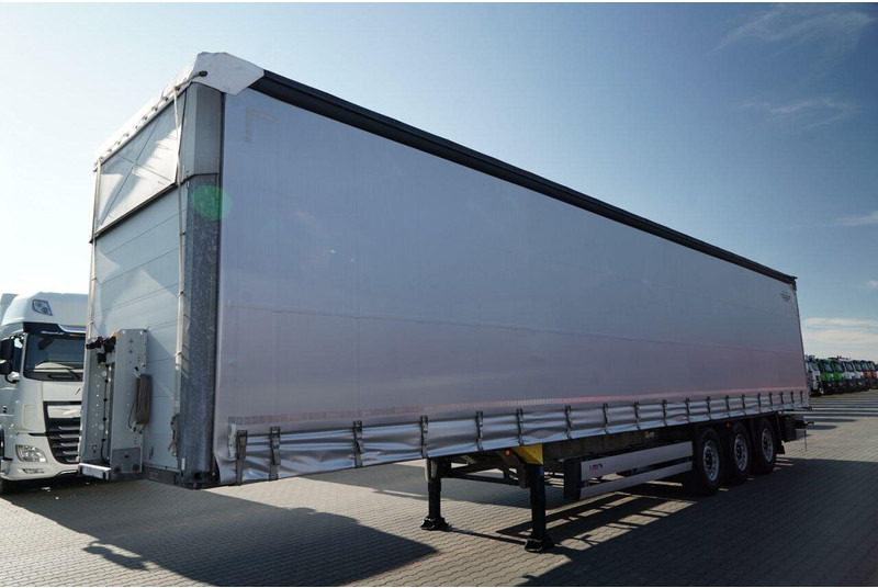 Schmitz Cargobull FIRANKA / STANDARD / MULDA DO STALI - 9 M / DACH PODNOSZONY / OŚ - Ponyvás félpótkocsi: 4 kép. Schmitz Cargobull FIRANKA / STANDARD / MULDA DO STALI - 9 M / DACH PODNOSZONY / OŚ - Ponyvás félpótkocsi: 4 kép.