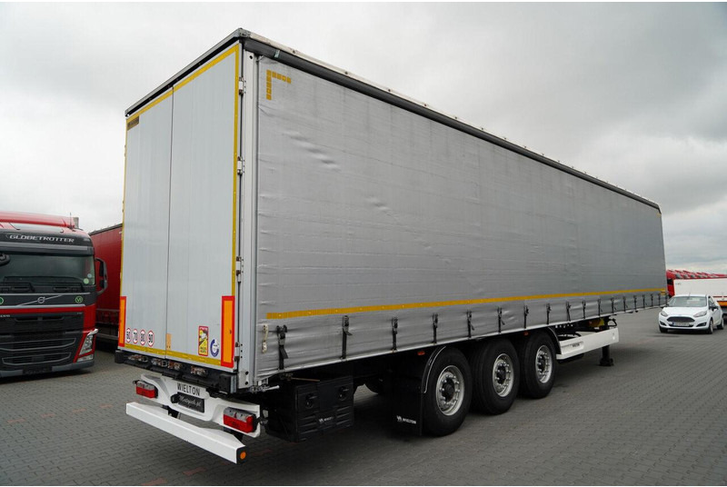 Wielton / FIRANKA / STANDARD / OŚ PODNOSZONA / PLANDEKA ZBROJONA - Ponyvás félpótkocsi: 5 kép. Wielton / FIRANKA / STANDARD / OŚ PODNOSZONA / PLANDEKA ZBROJONA - Ponyvás félpótkocsi: 5 kép.