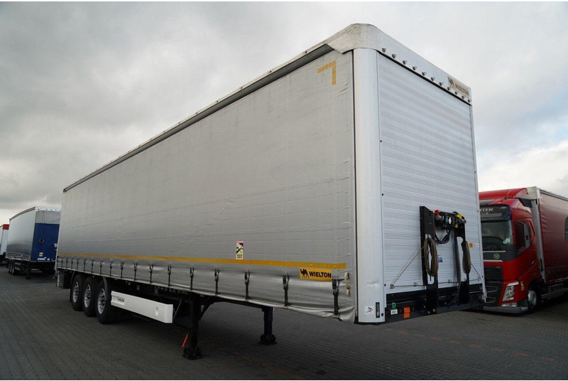 Wielton FIRANKA / STANDARD / OŚ PODNOSZONA / PLANDEKA ZBROJONA - Ponyvás félpótkocsi: 2 kép. Wielton FIRANKA / STANDARD / OŚ PODNOSZONA / PLANDEKA ZBROJONA - Ponyvás félpótkocsi: 2 kép.