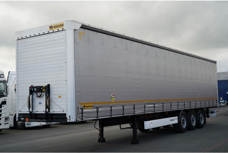 Wielton FIRANKA / STANDARD / OŚ PODNOSZONA / PLANDEKA ZBROJONA - Ponyvás félpótkocsi: 3 kép. Wielton FIRANKA / STANDARD / OŚ PODNOSZONA / PLANDEKA ZBROJONA - Ponyvás félpótkocsi: 3 kép.