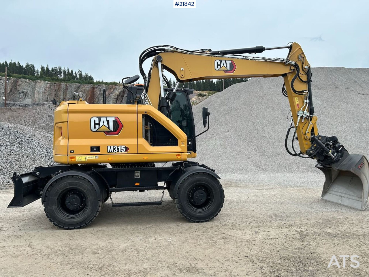 CAT M315 hjulgraver m/ tilt og skuffe - Kotrógép: 5 kép. CAT M315 hjulgraver m/ tilt og skuffe - Kotrógép: 5 kép.