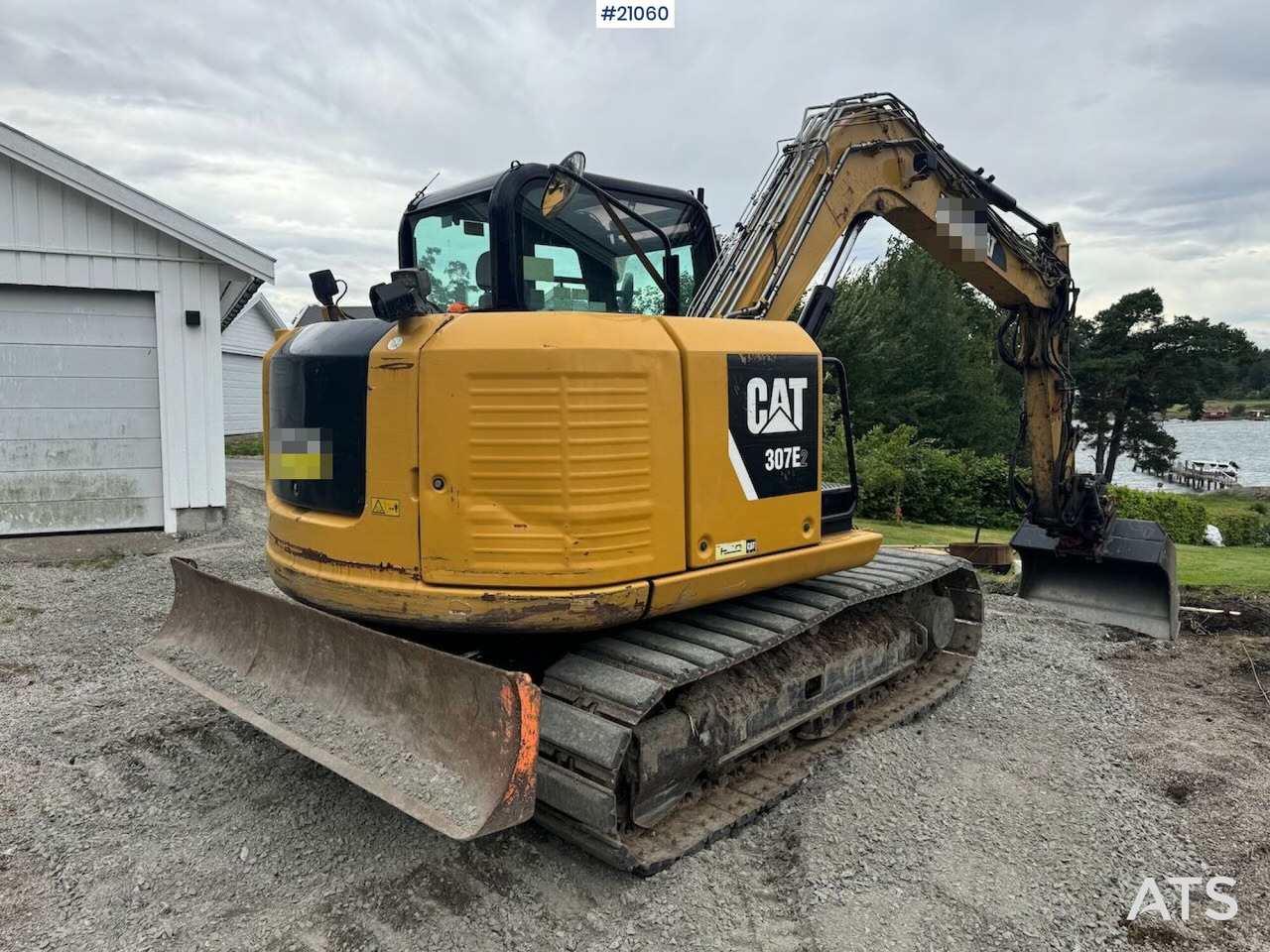 Caterpillar 307E2 - Lánctalpas kotró: 4 kép. Caterpillar 307E2 - Lánctalpas kotró: 4 kép.