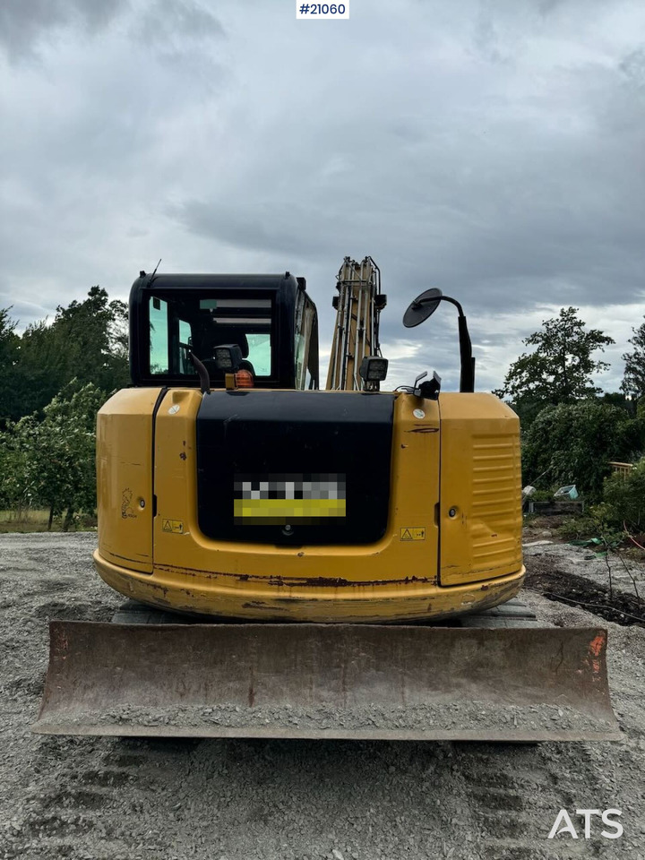 Caterpillar 307E2 - Lánctalpas kotró: 5 kép. Caterpillar 307E2 - Lánctalpas kotró: 5 kép.