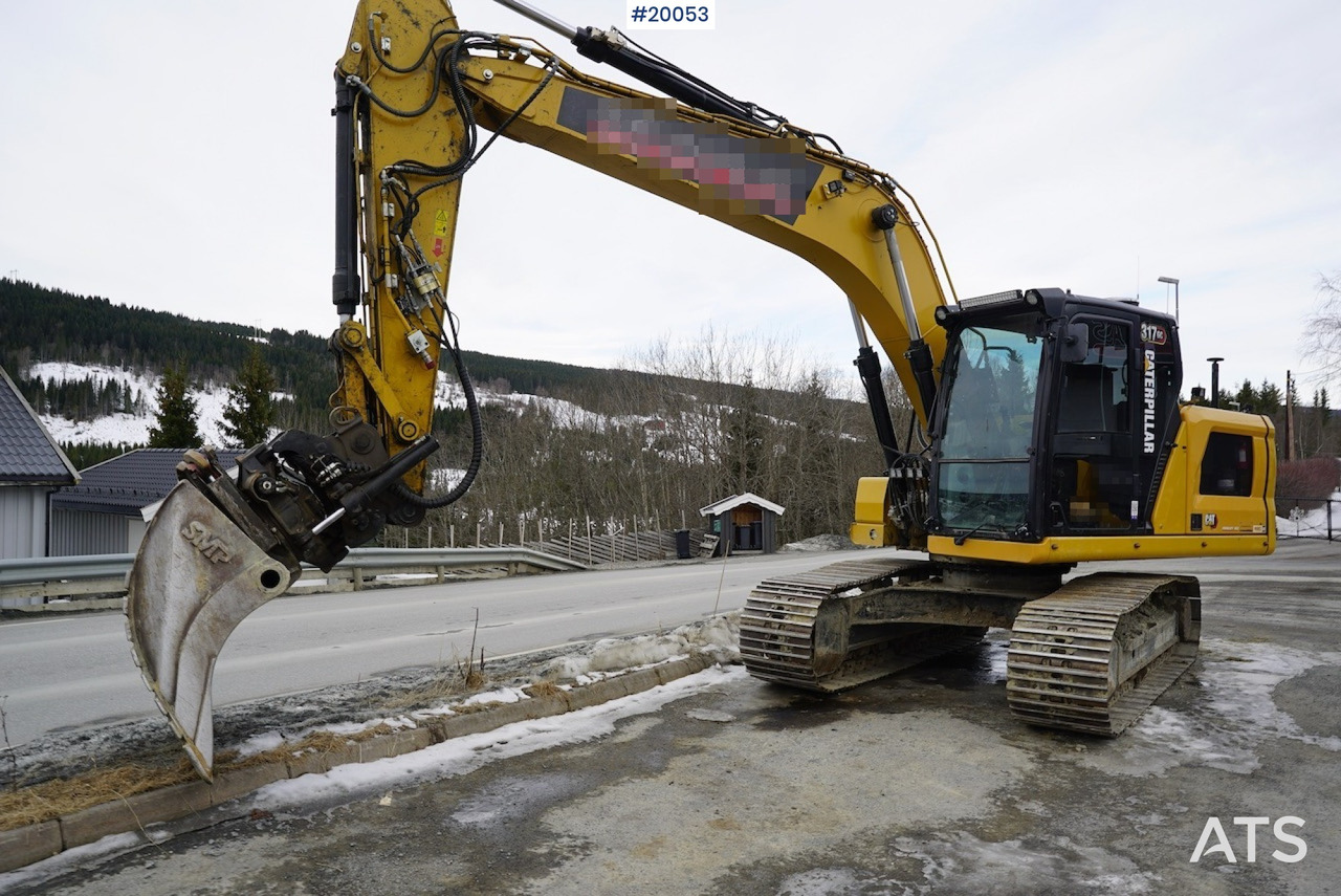 Caterpillar 317GC - Kotrógép: 2 kép. Caterpillar 317GC - Kotrógép: 2 kép.
