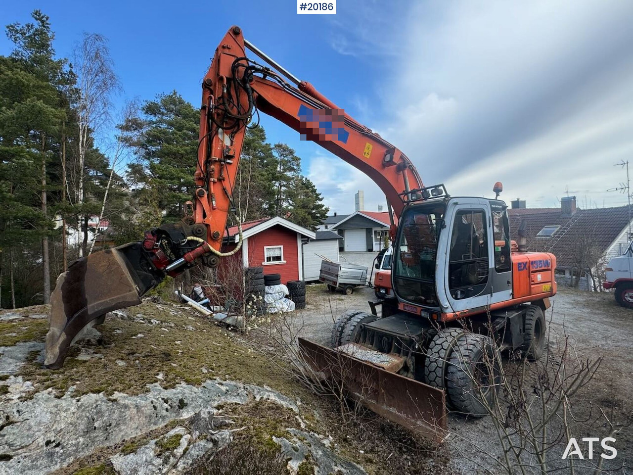 Hitachi EX135W - Kotrógép: 1 kép. Hitachi EX135W - Kotrógép: 1 kép.