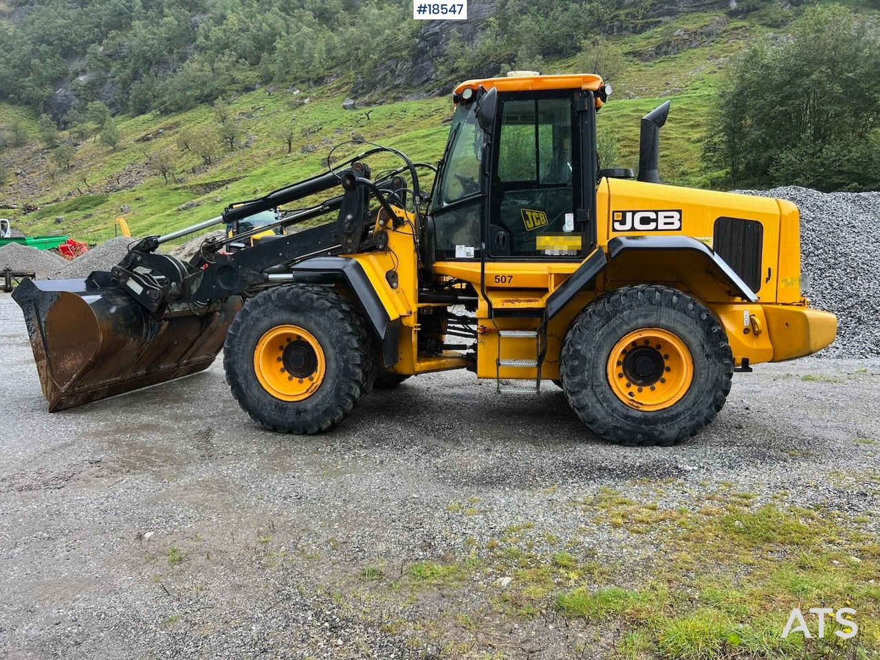 Jcb 437HT - Gumikerekes homlokrakodó: 5 kép. Jcb 437HT - Gumikerekes homlokrakodó: 5 kép.